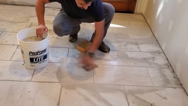 How to Remove Adhesive Tiles from Floor in Dubai